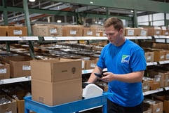 IPC-warehouse-employee-gathering-products-for-a-member-order